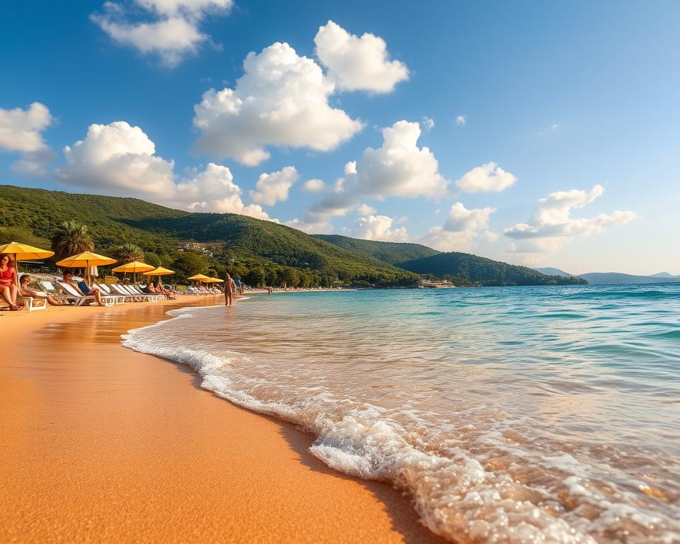 Aegina's stunning beaches, featuring soft golden sands and crystal-clear turquoise waters, create an inviting atmosphere. In the foreground, a gentle wave kisses the shore, revealing pebbles glinting in the sunlight. In the middle ground, sunbeds with bright umbrellas are arranged neatly, with a few people in modest casual clothing enjoying the sun and a family playing nearby, adding life to the scene. In the background, you can see lush green hills dotted with olive trees under a vibrant blue sky, with fluffy white clouds lazily drifting by. The scene is bathed in warm, golden hour lighting, casting long shadows and enhancing the inviting feel of this idyllic summer day. The composition is captured with a slight tilt to the horizon, emphasizing the gentle curves of the coastline.